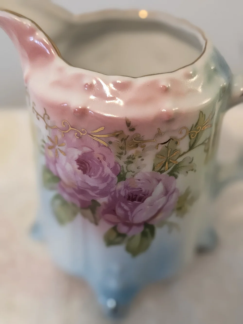 Antique Porcelain Footed Creamer R. S. Prussia Floral Design Trimmed In Gold.